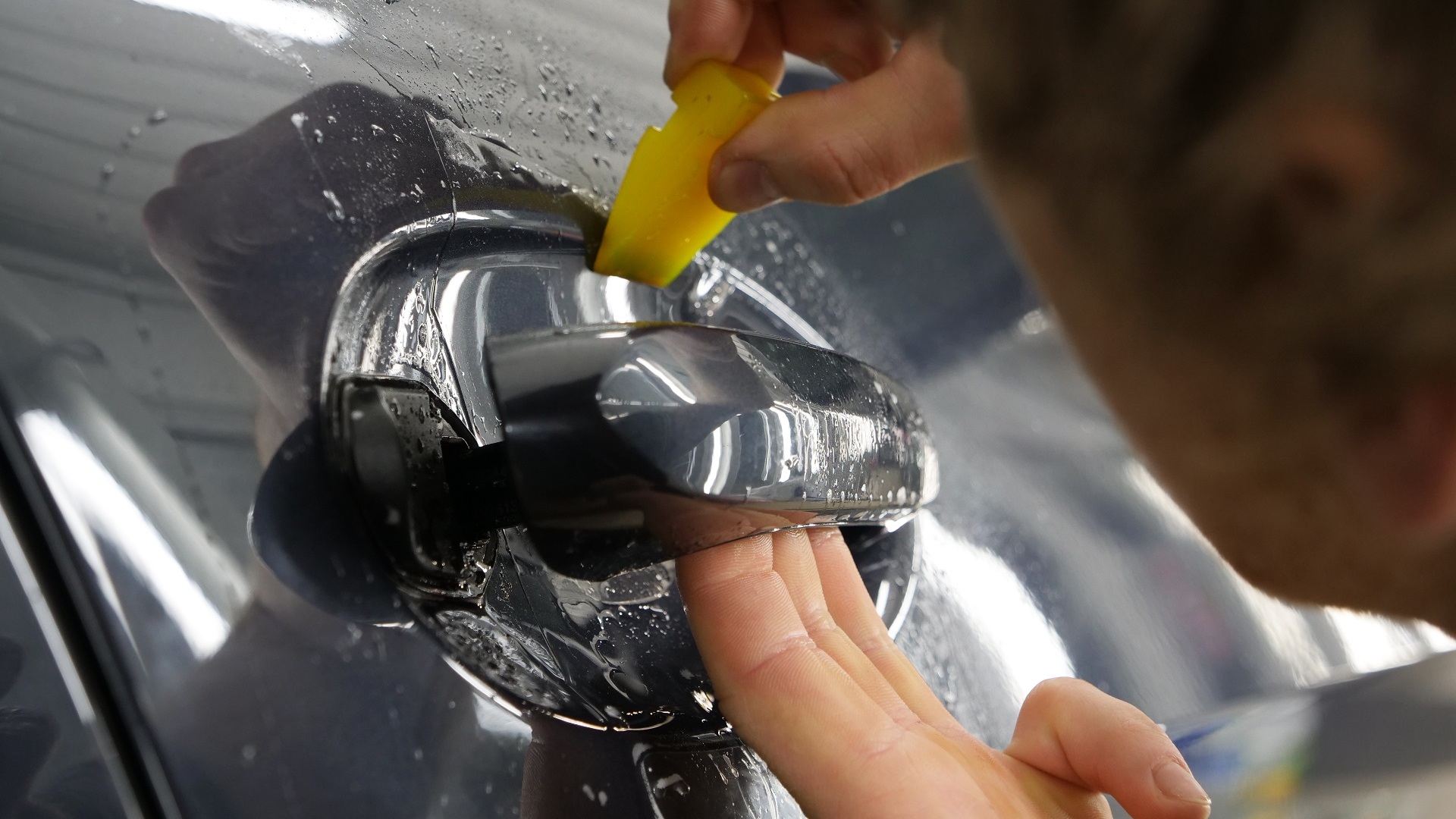 Close,Up,To,Ppf,Installation,Process,On,A,Front,Headlight